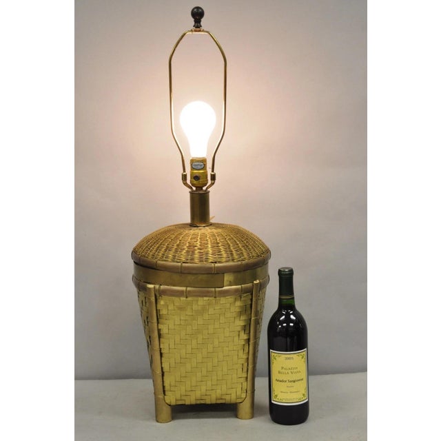 Vintage Chapman Hollywood Regency English Style Brass Woven Basket Table Lamp with Original Tags. Circa Late 20th Century....