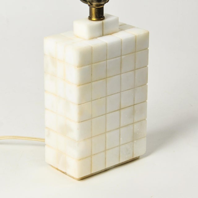 Unique vintage decorative table lamp in art deco style. Carved marble squares in a statement rectangular shape. Measures...