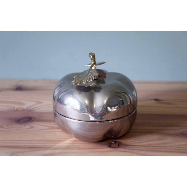 This vintage apple-shaped candy dish is a classic decorative object that combines functionality with sculptural...