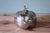 This vintage apple-shaped candy dish is a classic decorative object that combines functionality with sculptural...