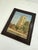 English architectural painting depicting a castellated church tower rising above a village street. Signed "John J. Fyson,...