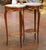 Add a touch of French elegance to a living room, bedroom, or study with this refined pair of side tables. Crafted in...