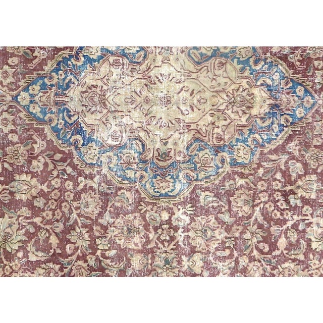 1950s Persian Kerman Rug. Hand woven in the Kerman region of Iran. Distressed and refinished in the U.S. The Persian...