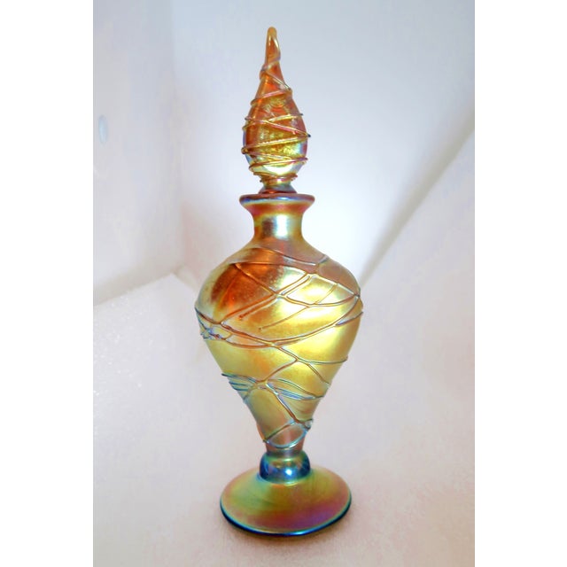 Steven Lundberg was one of the truly great glass artists of the 20th Century. This elegant perfume bottle is a wonderful...