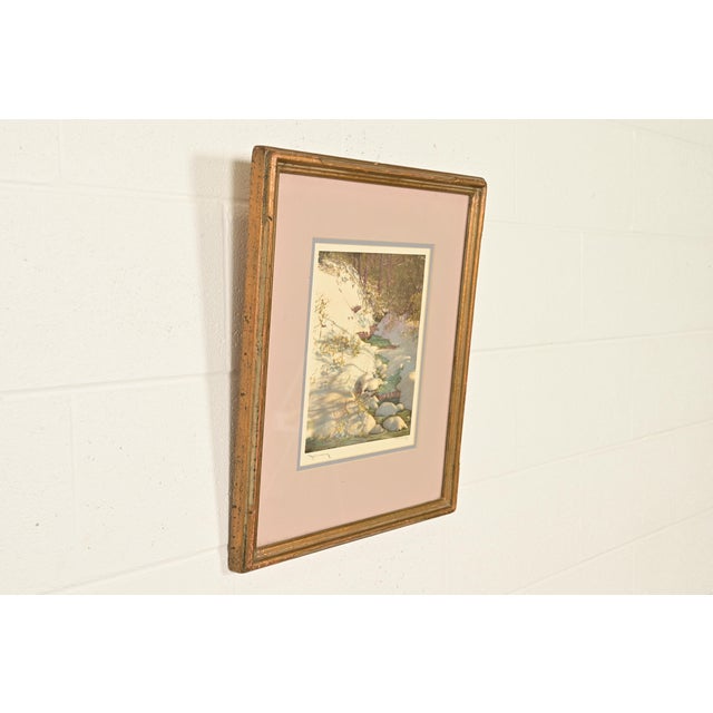 A beautiful lithograph entitled "January" in carved giltwood frame By J. Hohenberger Germany, Circa Mid-20th Century...