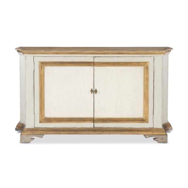 The Italian two-door buffet, inspired by 19th-century designs, showcases a blend of traditional and contemporary elements,...