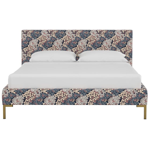 This low profile fully upholstered platform bed is a perfect piece for anyone looking to add a modern statement piece to...