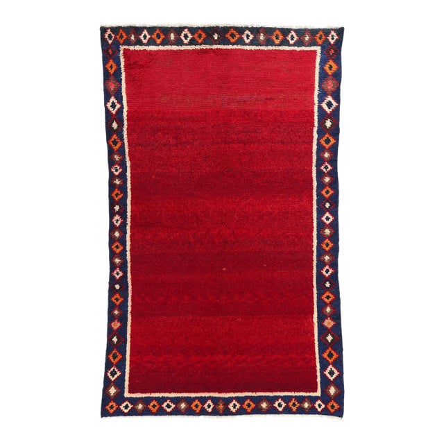Vintage Persian Lori Solid Red Field Rug - 05'03 X 08'05 For Sale