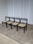 Set of four vintage dining chairs by Stol Kamnik, produced in Yugoslavia in the 1970s. The chairs feature a clean, minimal...