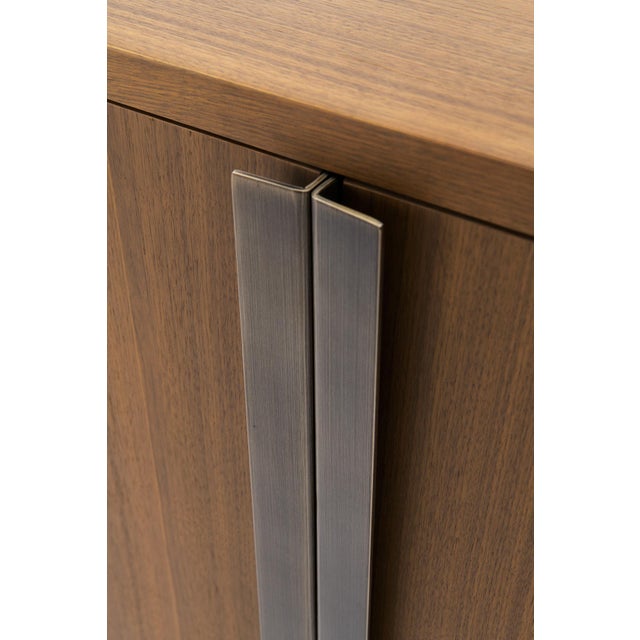 Modern Walnut and Bronze Buffet Designed by Greg Sheres; "Valencia". In Stock The Valencia Buffet is a sophisticated...