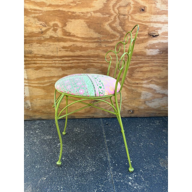 Elegant green iron peacock chair that would be perfect as a vanity desk chair or as an accent chair for a porch or garden....