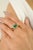 Introducing our 14K Gold octagon cut emerald Signet Ring, showcasing 2.76 ct of emerald in a sleek prong setting. This...