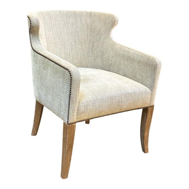 Design Plus Gallery presents the Tuktu Dining Room Chair from Ironies. The chair has a thick, woven upholstery in tan...