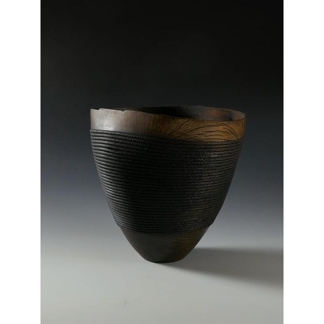 Rope Bowl in Evergreen Oak Oxides Wood by Yann Marot Dimensions: D 25 x W 22 x H 25 cm Materials: Evergreen Oak Oxides...