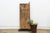 Carved from a single length of hardwood, this door features a motif documented specifically within Dogon granary door...