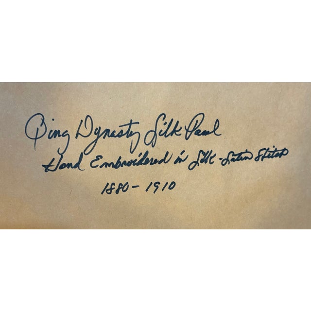 Early 20th-century red Chinese embroidered silk textile panel in black wood frame. Excellent condition. Measures 23.5" x...