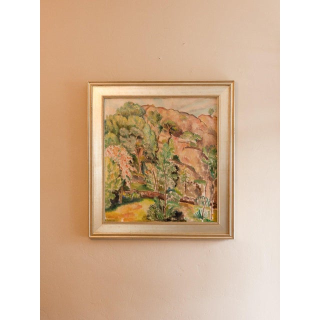 Oil landscape of a sunlit rocky hillside with slender trees and a flowering pink tree in the foreground, painted in loose,...