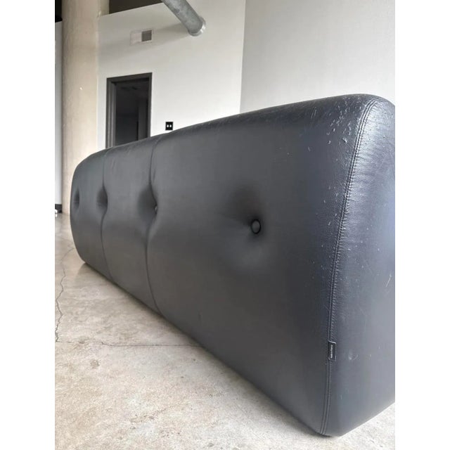 Vintage Ligne Roset “Kali” Sofa – Black Leather (1970s) Rare Michel Ducaroy–designed three-seater for Ligne Roset....