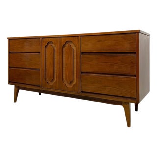 Vintage Mid Century Modern Long Low Dresser With 12 Drawers, Tapered Legs and Brass-Toned Hardware For Sale