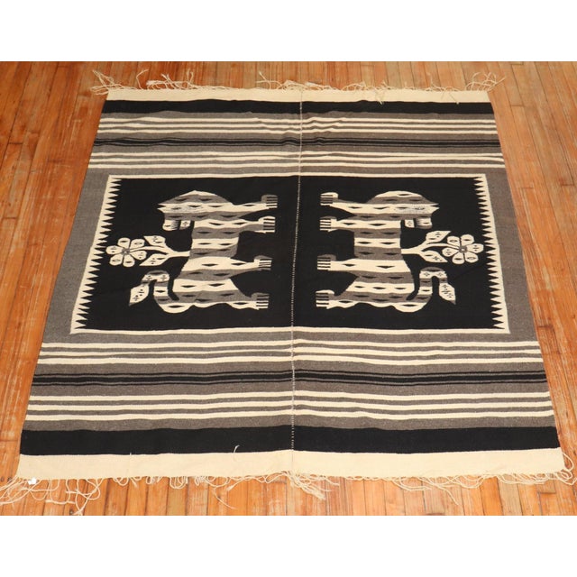 A late 20th-century Mexican textile mountain lion textile rug