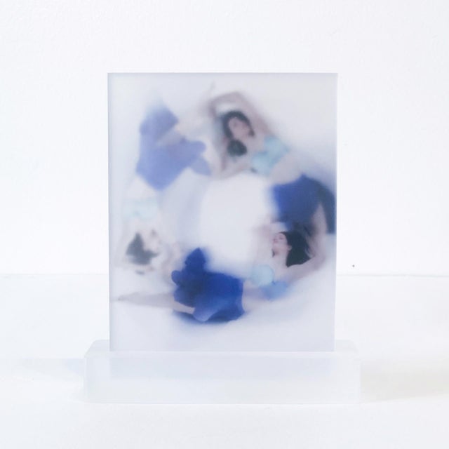 Into the Blue features a dynamic composition on five acrylic panels, capturing a fluid interplay of movement and color....