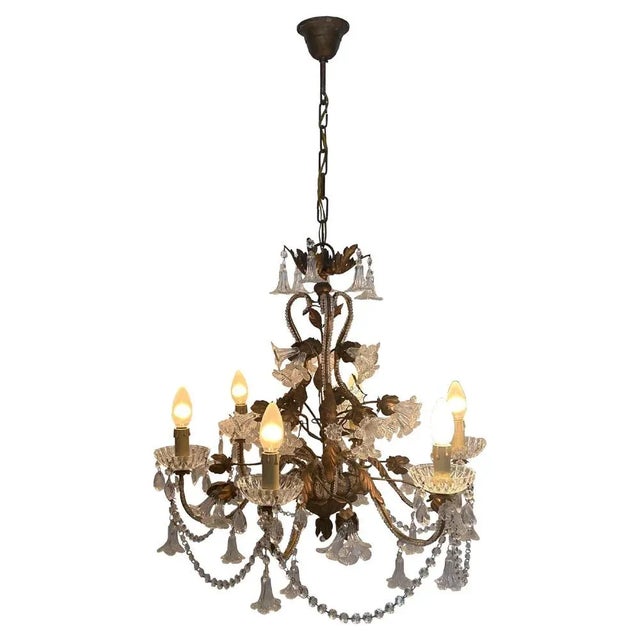 A hand made Murano chandelier, extremely elegant and romantic. Up to 250V (Europe/UK Standard).The wiring of this item may...