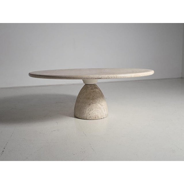 Finale 1790 travertine dining table by German designer Peter Draenert. From the 1970s. Characterized by its sculptural...