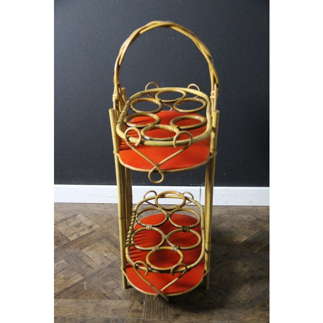 A stunning vintage bamboo and rattan bar dating from the mid-20th century, this highly decorative piece is distinguished...