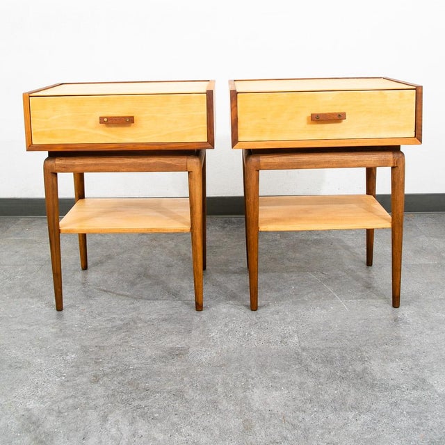 Rare high contrast Italian mid century nightstand set / pair of end tables. This nightstand features two levels, the top...