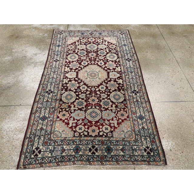 An antique Indian Agra accent rug. Here is a perfect northern workshop Indian copy, with a longer pile, of a Caucasian...