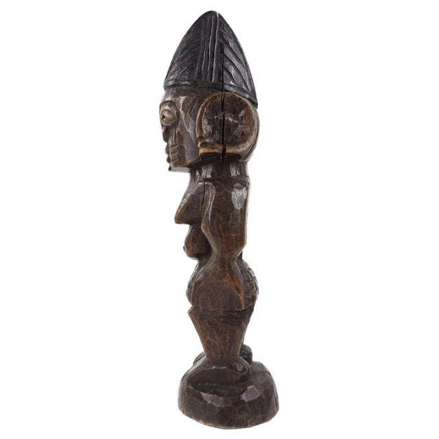 Ibeji figures, carved by the Yoruba people of Nigeria, are wooden twin sculptures holding cultural significance in Yoruba...