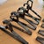 Set of 10 1970’s Modernist Black Plastic Hangers Attributed to Finnish Designer Maija Ruoslathi For Sale - Image 4 of 11