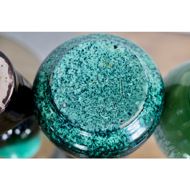 Set of 4 accolay vases, signed ceramics, france 1960s. very good condition 60s design green cracked: 25 x 16 cms dark...