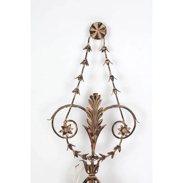 An attractive pair (2) of Lillian August (label verso) Italian / Florentine design tole style wall sconces. The sconces...