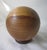 Fabulous Mid Century wood pen/pencil holder. Globe shaped and hand carved. It measures 5"H x 5"D and is in excellent...