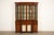 A beautiful English Regency or Georgian style breakfront bookcase or dining cabinet By Kittinger USA, Circa 1960s Carved...