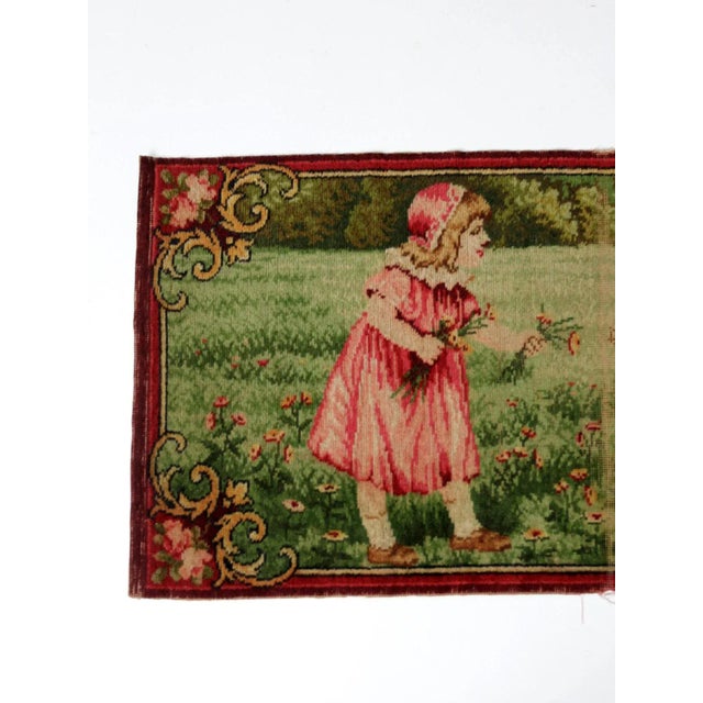 This 19th-century woven tapestry depicts a charming pastoral scene of a young girl with her sheep. The decorative wall...