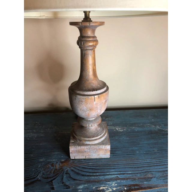Architectural finial wood-like base table lamp. Beautiful custom humidity-resistant lampshade included. Great for a...