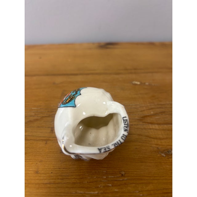 Bring the charm of the British seaside into your home with this Vintage Ceramic Shell made by Arkinsall & Sons of Stoke-...