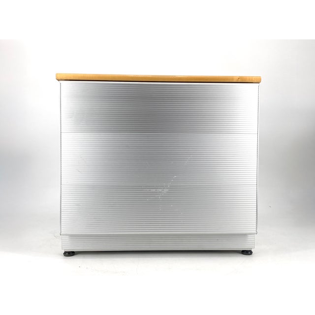 A cabinet * small, square cabinet * with a removable rail for hanging files. Without the insert, it's also ideal as a...