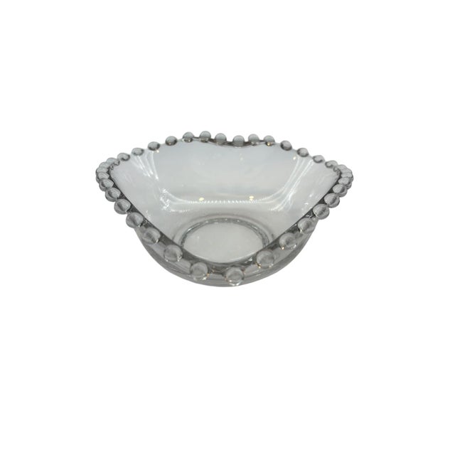 This charming heart-shaped dish is part of the Candlewick line. Manufactured by Imperial Glass, it's handcrafted. It's...