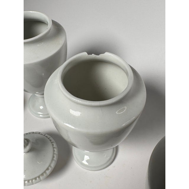 Neoclassical Small White Porcelain Lidded Urns, Set of 3 For Sale - Image 11 of 12