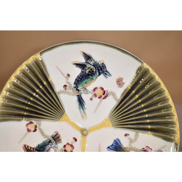 19th Century majolica bird and fan pattern plate from England. There is an impressed WEDGWOOD mark on the back of the...