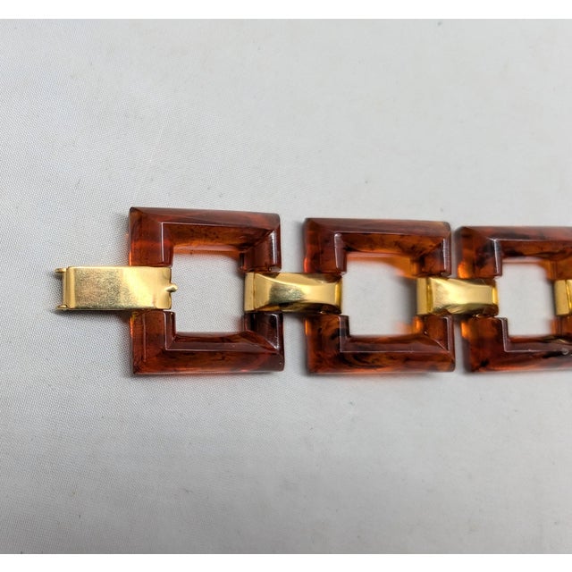 Mid-Century Modern Vintage 1970s Signed Crown Trifari Goldtone & Amber Lucite Link Bracelet For Sale - Image 3 of 7