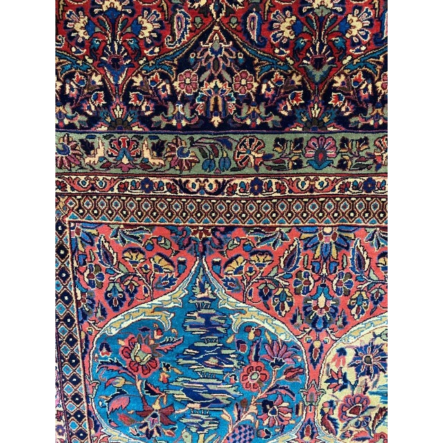 ACTUAL SIZE: 11'8" X 20'8' PRIMARY COLOR: Rust / Navy AGE: Old MATERIALS: Wool FOUNDATION: Cotton PRODUCTION: Handwoven,...