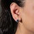 A matched pair of Ceylon blue sapphires glows in deep, velvety blue in these solid 14K white gold earrings, each framed by...