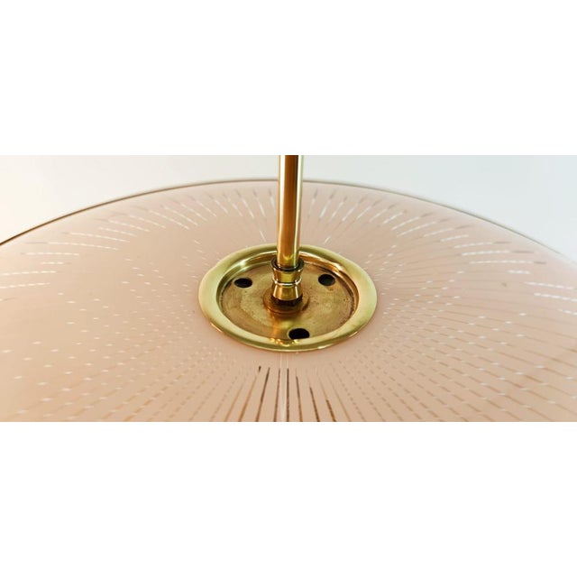 Brass Suspension Light with Double Salmon Pink Glass Shade, in Very Good conditions. Designed 1950 to 1959 Up to 250V...