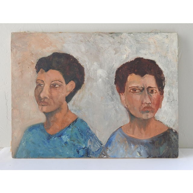 Mid 20th century oil on canvas portrait painting of two views of the same woman in a blue dress. Unsigned. Unframed, edge...