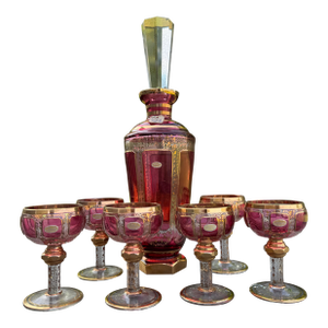 Early 1900s Moser Bohemian Cranberry Paneled Cabochon 24k Gold Decanter Set