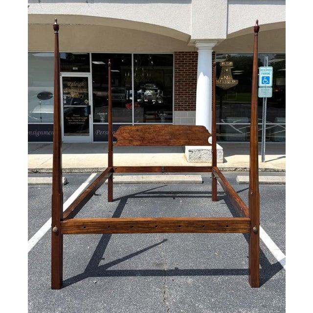 This custom-made solid mahogany queen size four post bed frame showcases timeless craftsmanship with its elegant tapered...